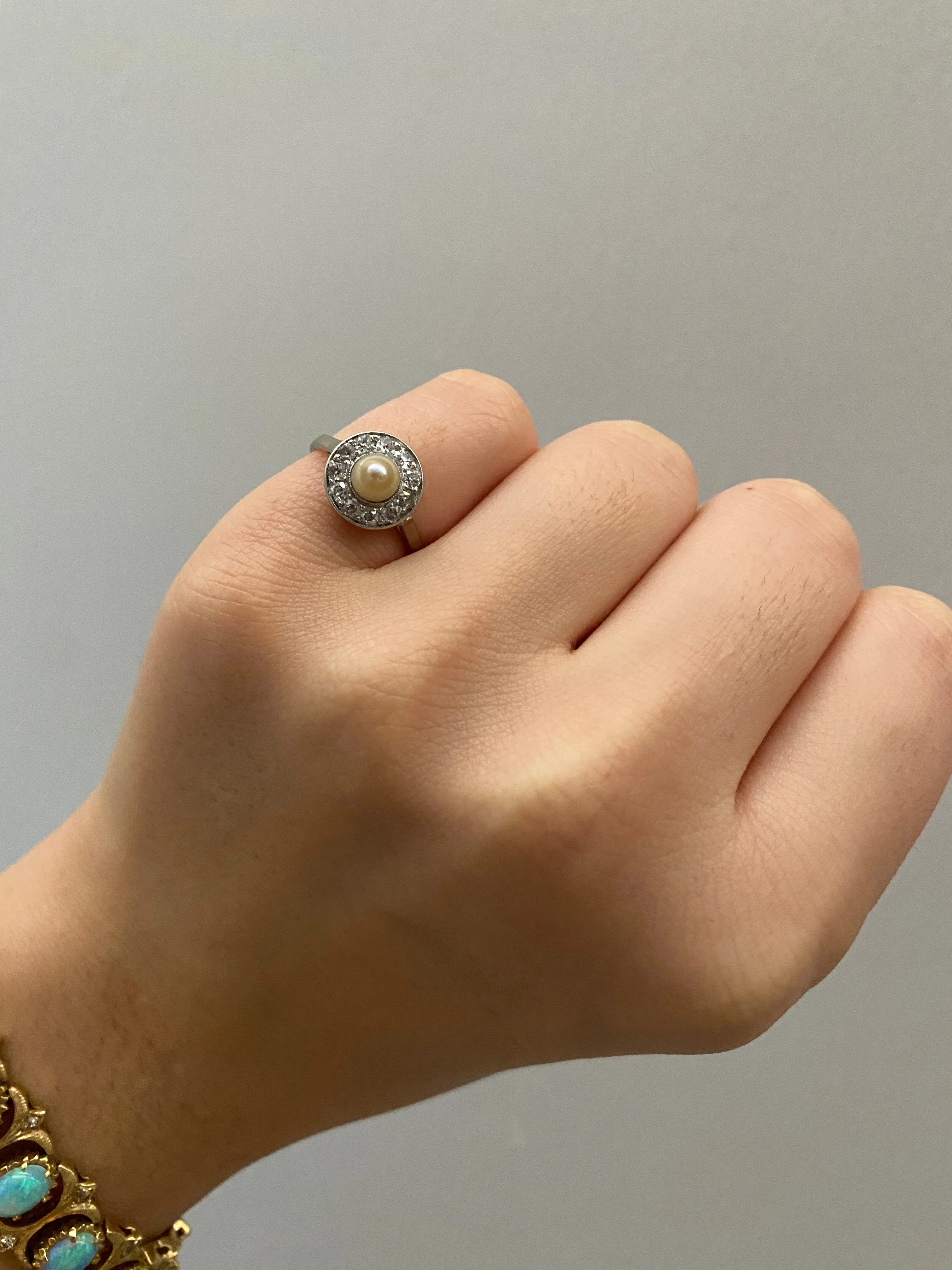 Art Deco Platinum and 14K Gold Pearl and Diamond Halo Ring