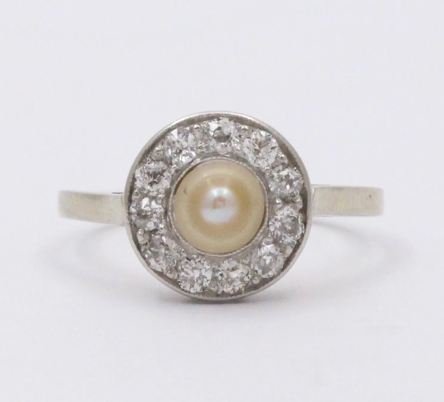 Art Deco Platinum and 14K Gold Pearl and Diamond Halo Ring