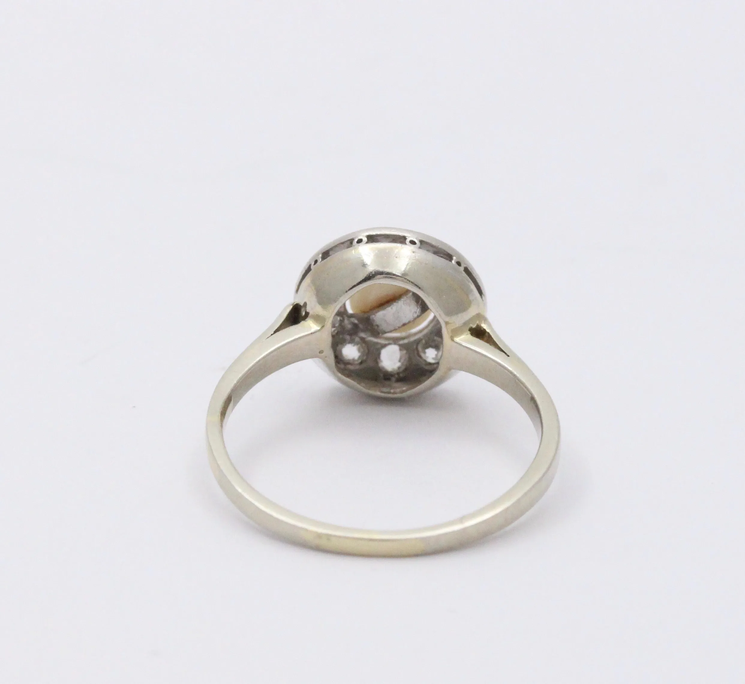 Art Deco Platinum and 14K Gold Pearl and Diamond Halo Ring