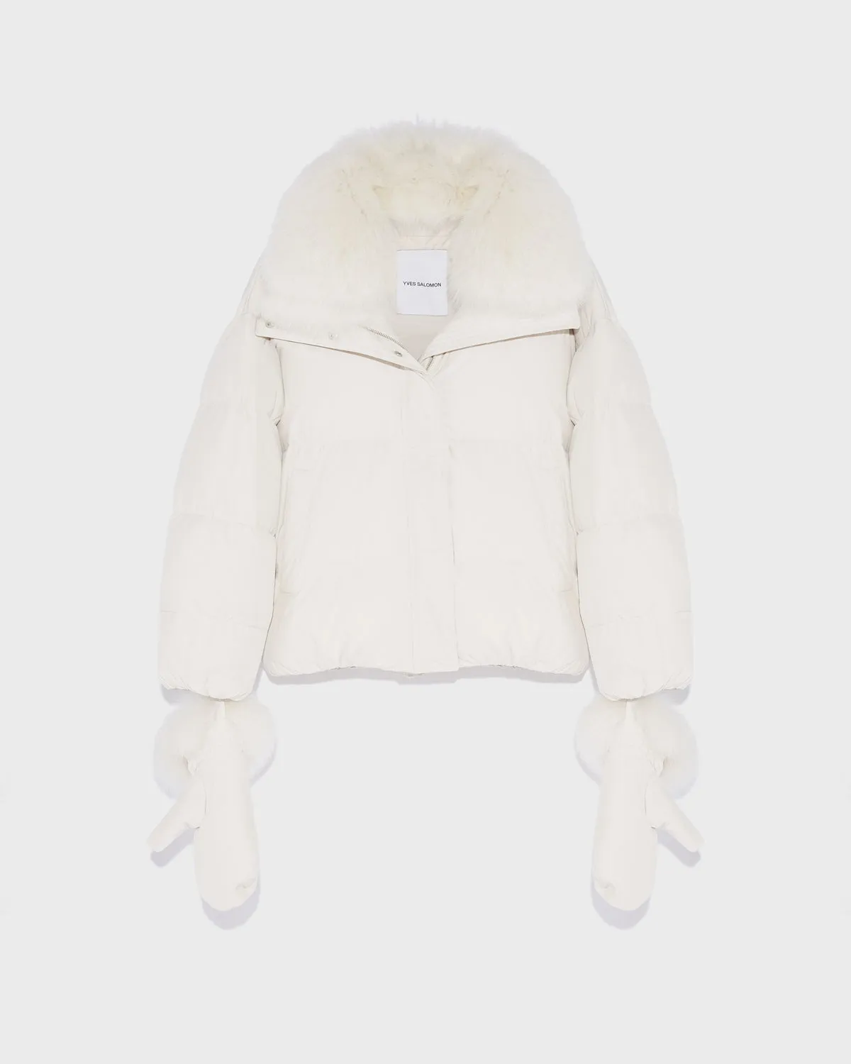 Boxy down jacket in waterproof technical fabric with fox fur collar