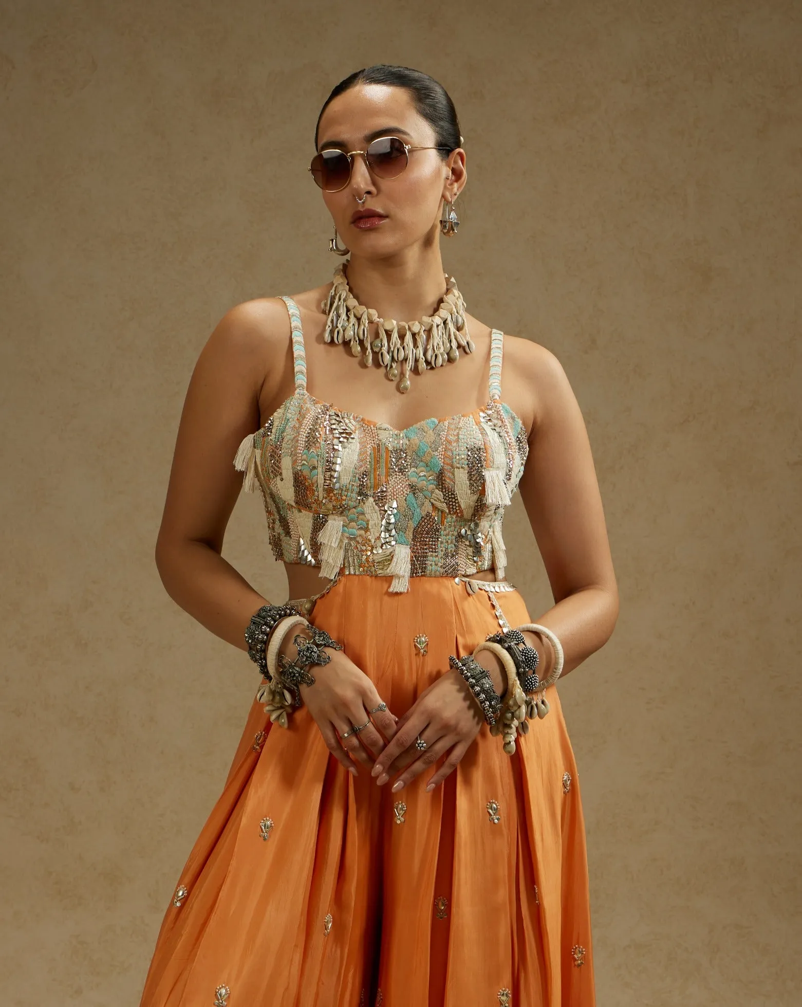 Orange embellished jumpsuit with pockets